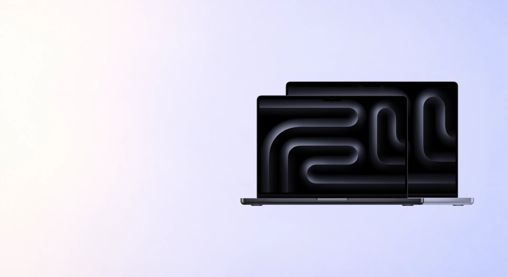 Два отворени MacBook Pro в Space Black и Silver
